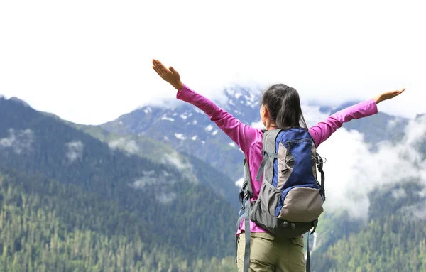 Cheering hiking woman open arms on mountain peak of tibet,china — Stock Photo, Image