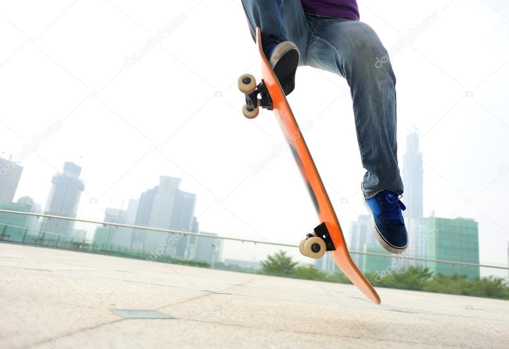 Woman skateboarder skateboarding