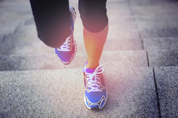 Woman legs running up on  stairs — Stock Photo, Image