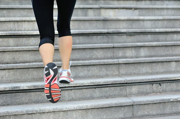 Woman legs running on  stairs — Stock Photo, Image