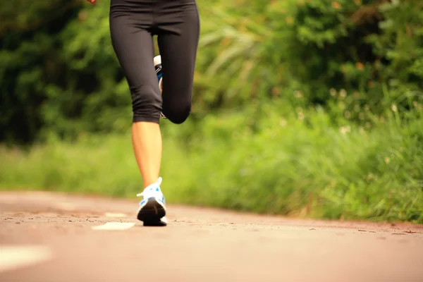 Woman legs running at forest — Stock Photo, Image