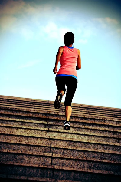 Runner athlete running on stairs. woman fitness jogging workout wellness concept. — Stock Photo, Image