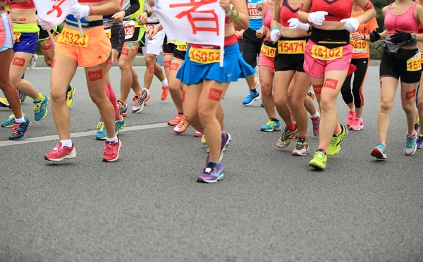 Marathon runners on the street — Stock Photo, Image