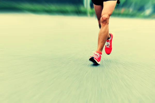 Athlete running at marathon — Stock Photo, Image