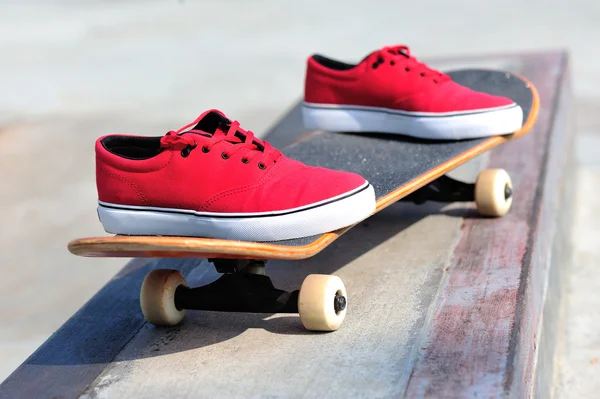 Sport sneakers on skateboard — Stock Photo, Image