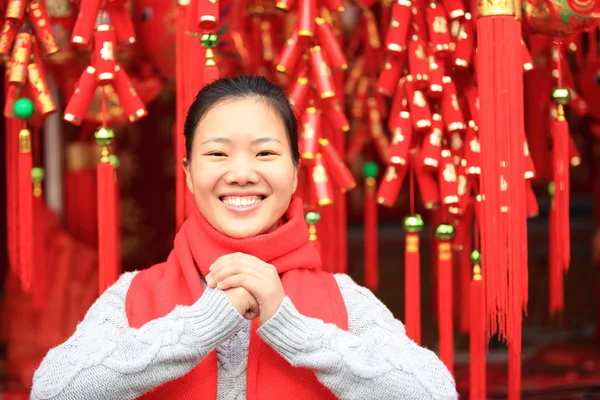 Woman gesturing happy new year — Stock Photo, Image