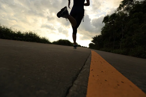 Runner athlete running at seaside road — Stock Photo, Image