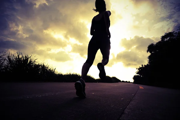 Runner athlete running at seaside road — Stock Photo, Image