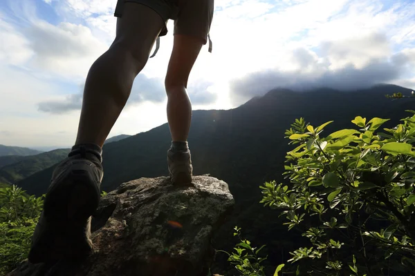 Woman Hiker Legs Climbing Sunrise Mountain Peak Rock — Stock Photo, Image