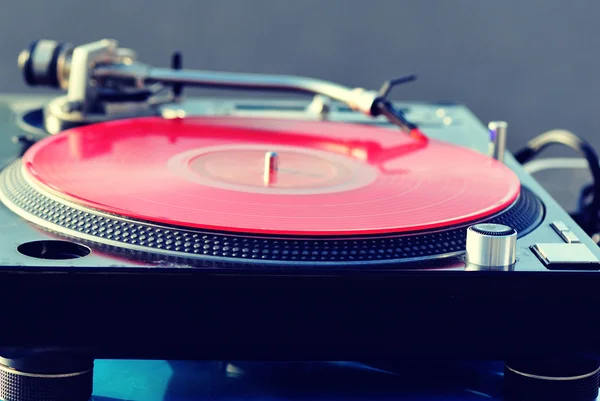 Spinning disk and headphone — Stock Photo, Image