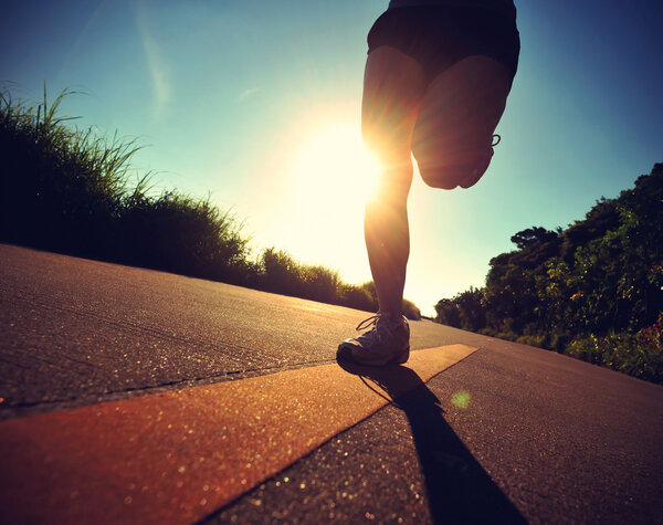 Young fitness woman running