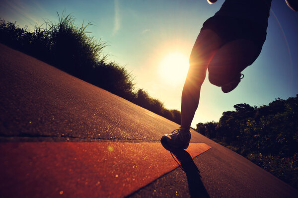 Young fitness woman running