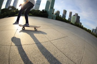 Kaykaycı bacaklar City adlı kaykay