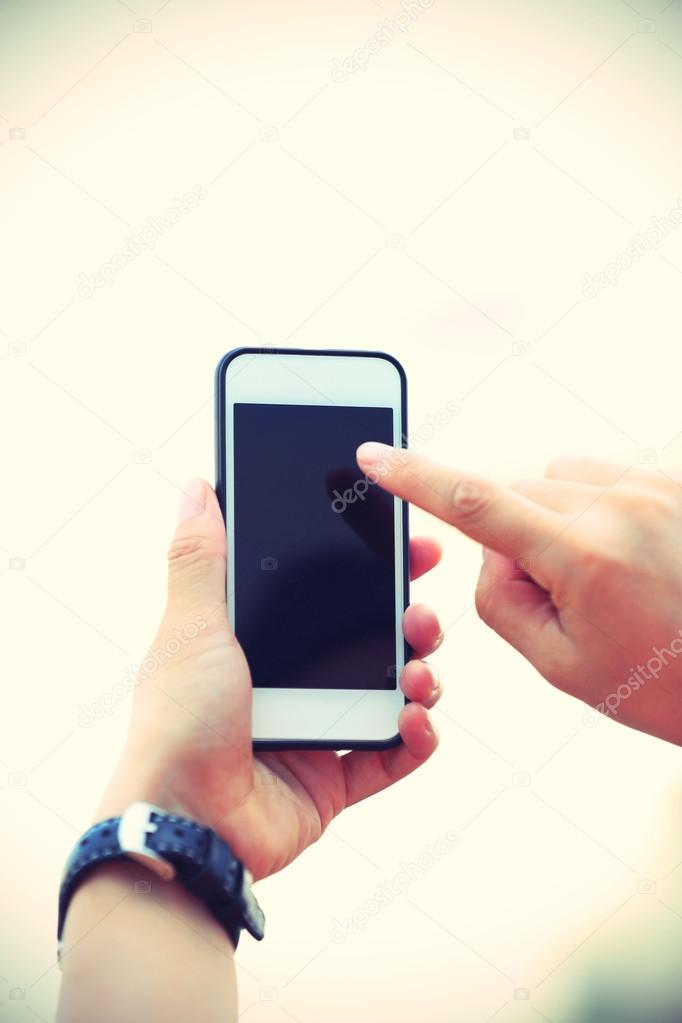 woman hands using smart phone