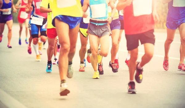 Marathon runners on road — Stock Photo, Image