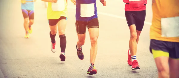 Marathon runners on city road. — Stock Photo, Image