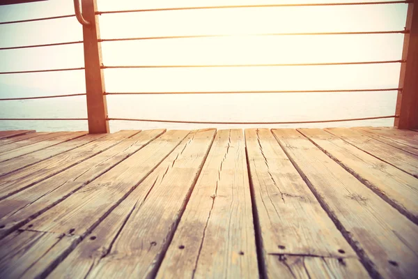 Wooden boardwalk on seaside — Stock Photo, Image