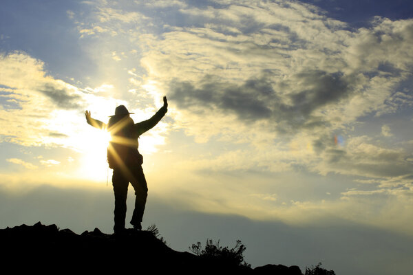 woman hiker with open arms