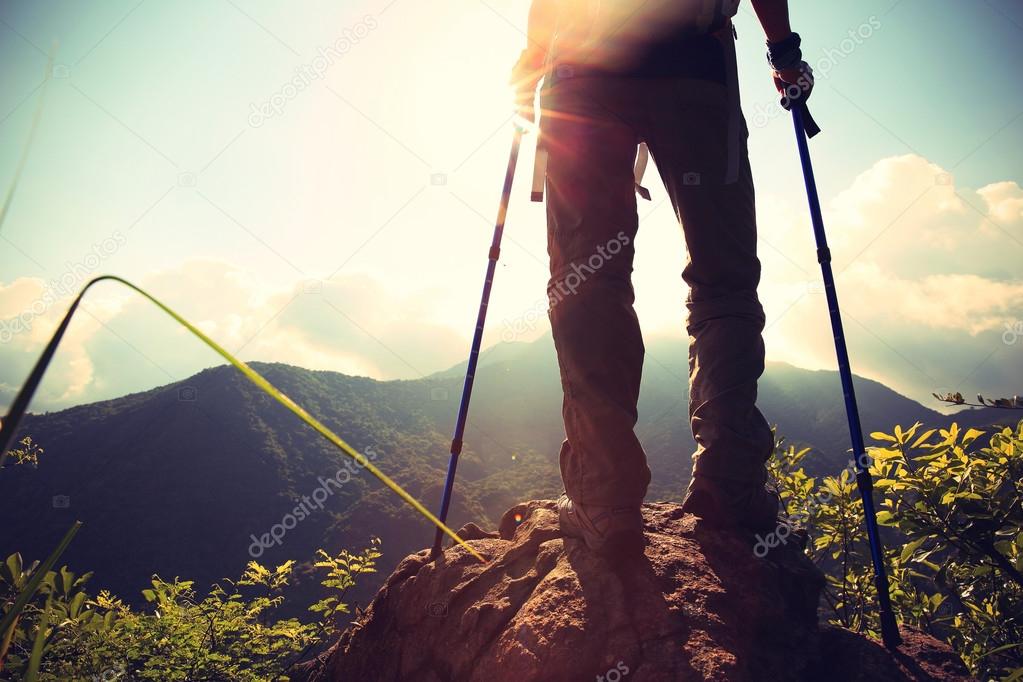 woman hiker on mountain peak