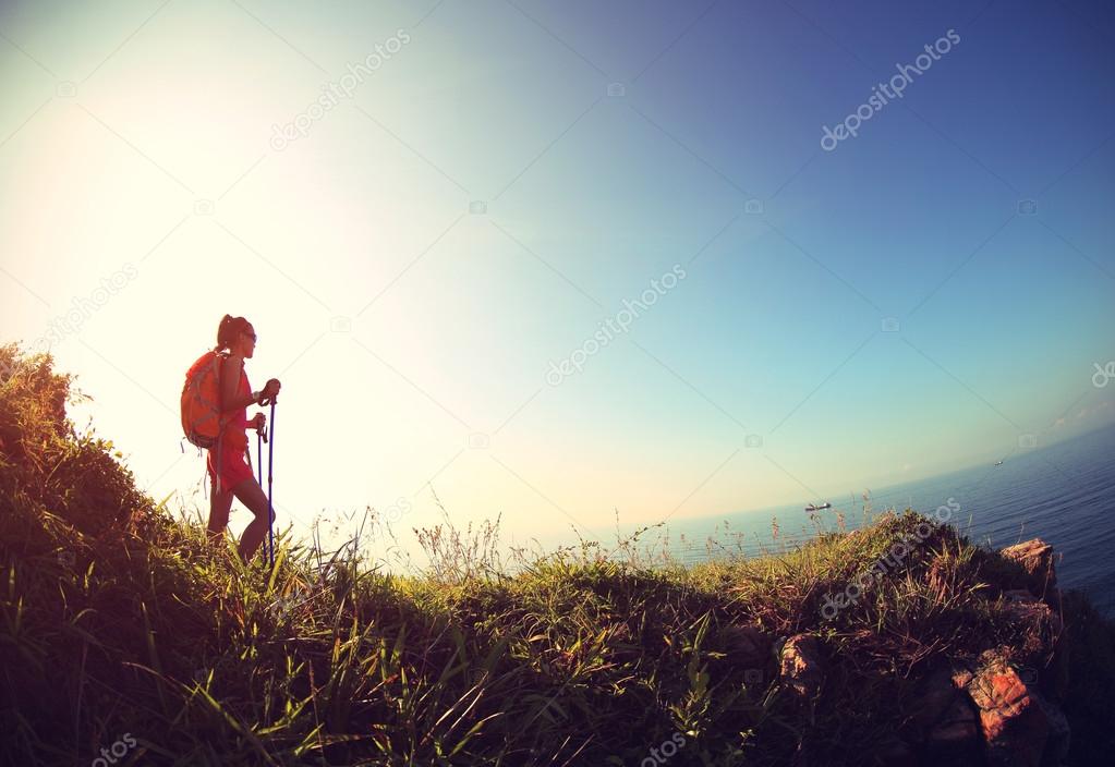 young woman hiking on mountain