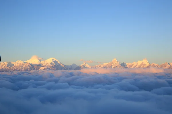 clouds and snow mountains landscape