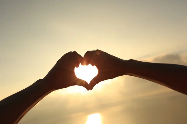 Hands making Heart shaped sign — Stock Photo, Image