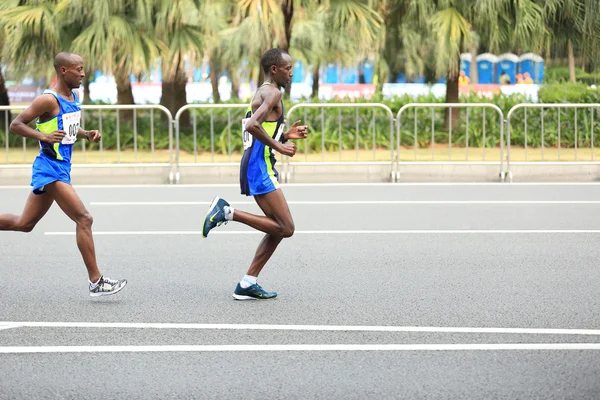 Marathon runners running on road — Stock Photo, Image