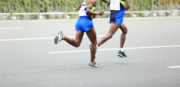 Marathon runners running on road — Stock Photo, Image