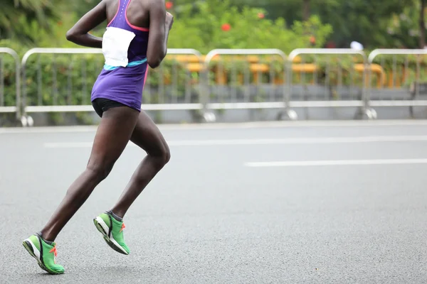 Marathon runners running on road — Stock Photo, Image