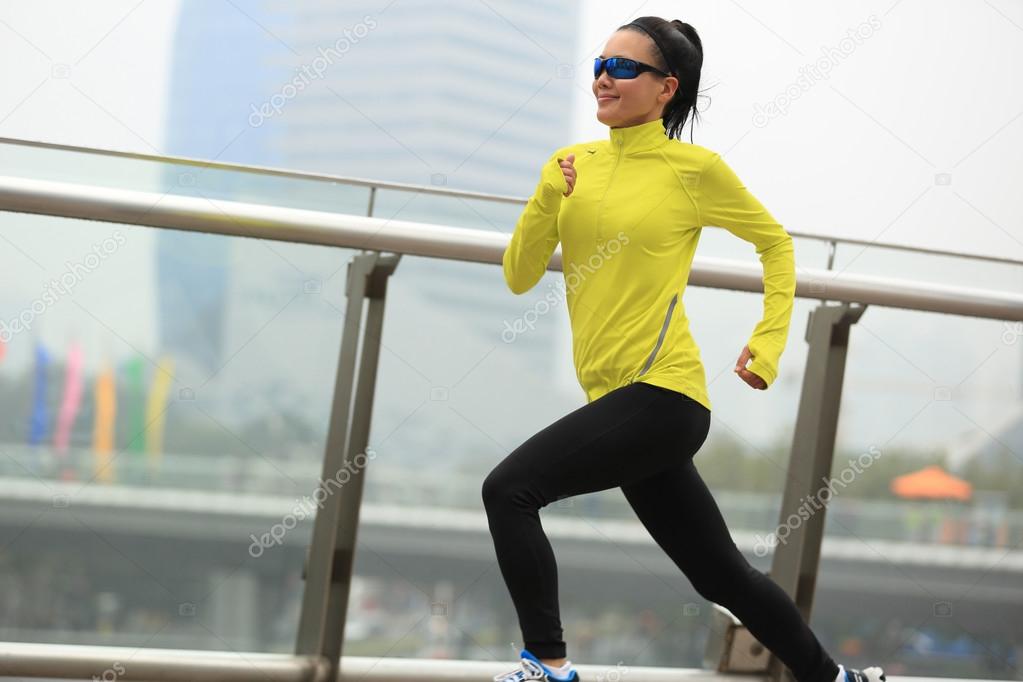 woman running at shanghai city