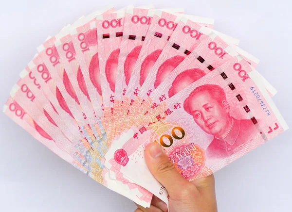 Hand with yuan money bills — Stock Photo, Image