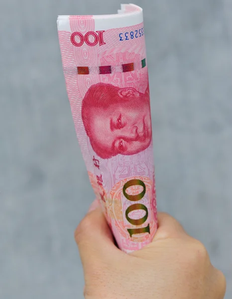 Hand with yuan money bills — Stock Photo, Image