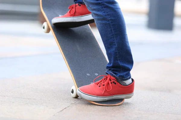 Female skateboarder with board — Stock Photo, Image