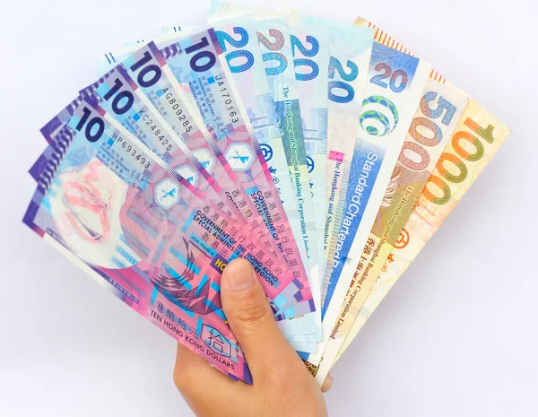 Hong kong Doları ile el — Stok fotoğraf
