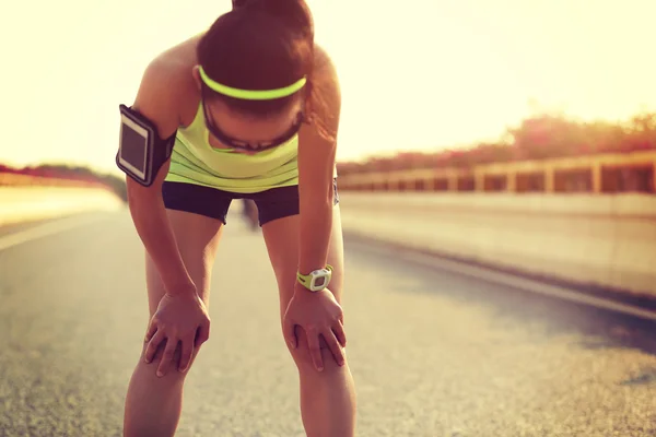 Tired woman runner — Stock Photo, Image