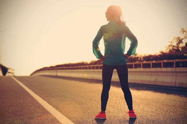 Fitness woman runner on road — Stock Photo, Image