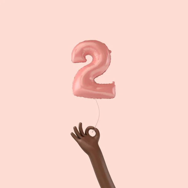 Рука тримає 2-й день народження рожеву фольгу святкування повітряної кулі. 3D рендерингу — стокове фото