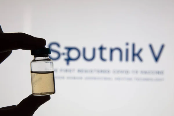 OXFORD, UK - February 2020: Sputnik V covid vaccine logo with injection vil — 스톡 사진