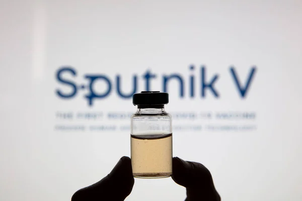 OXFORD, UK - February 2020: Sputnik V covid vaccine logo with injection vil — 스톡 사진