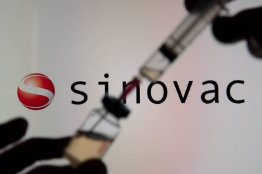 OXFORD, UK - February 2020: Sinovac company chinese based coronavirus vaccine clipart