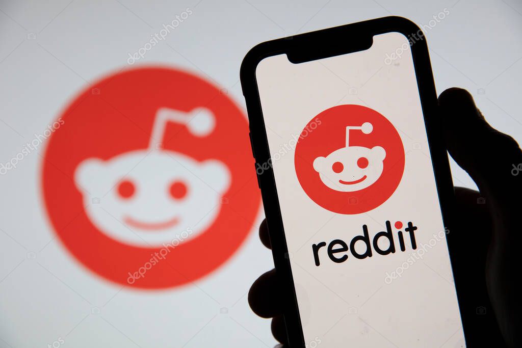LONDON, UK - February 2021: Reddit logo displayed on a smartphone device.