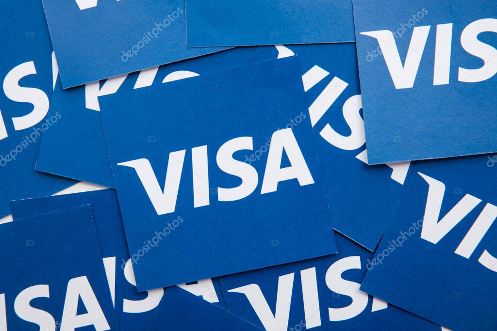 LONDON, UK - March 2021: Visa financial service brand logo background.
