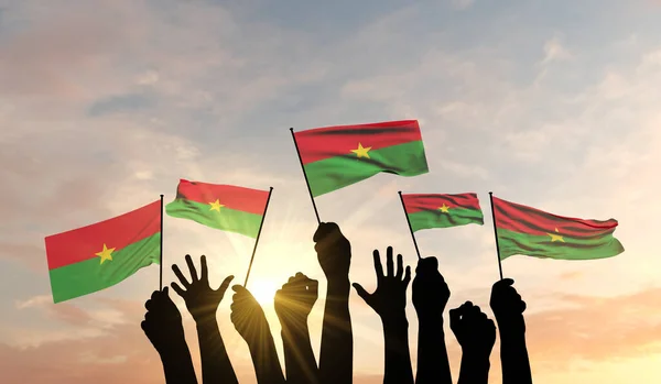 Silhouette di braccia alzate sventolando con orgoglio una bandiera del Burkina Faso. Rendering 3D — Foto Stock