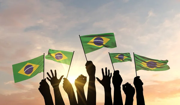 Силует рук підняв махання бразильського прапора з гордістю. 3D Рендерінг — стокове фото