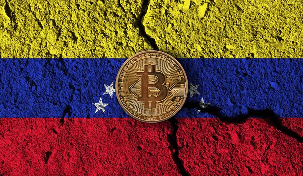 Bitcoin crypto currency coin with cracked Venezuela flag. Crypto restrictions — Stock Photo, Image