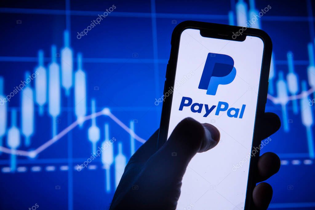 LONDON, UK - August 2021: Paypal finance service logo on a smartphone.