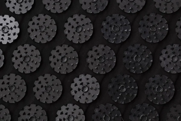 Bir sürü plastik çivili akupunktur paspası. Alternatif terapi ve rahatlama ilacı.