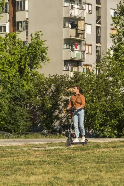 Young Beautiful Woman Rides Electric Scooter Urban Settlement Older Buildings — Stock Photo, Image