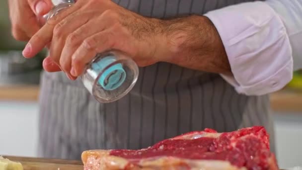 Close Chef Salting Meat Wooden Kitchen Board Well Putting Pepper — Stock Video