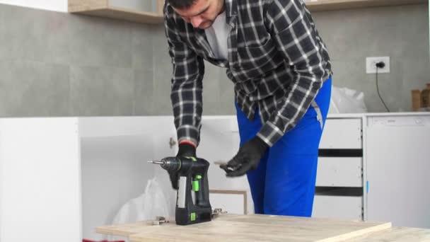 Carpenter Sets Screws Mechanisms Joints Kitchen Shelf Door — Stock Video